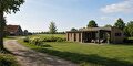 Mantelzorgwoning aan onverhard pad